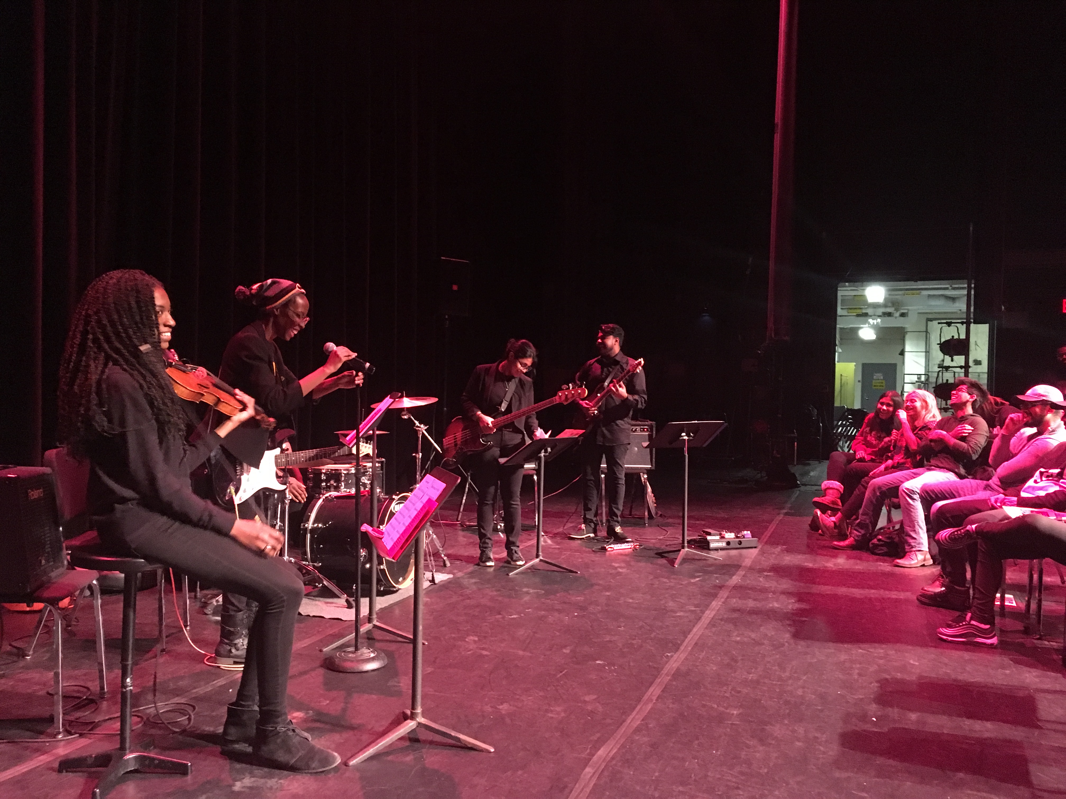 Students in performance at a senior recital.